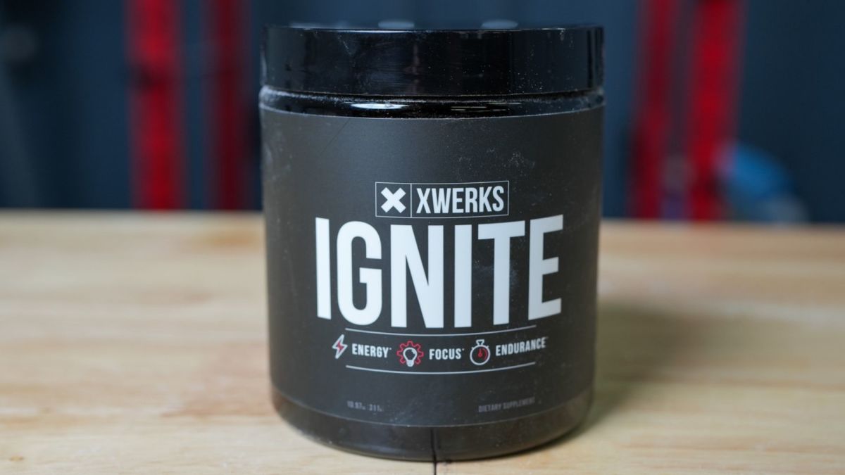 Black tub with white writing that says "XWERKS IGNITE" on a table